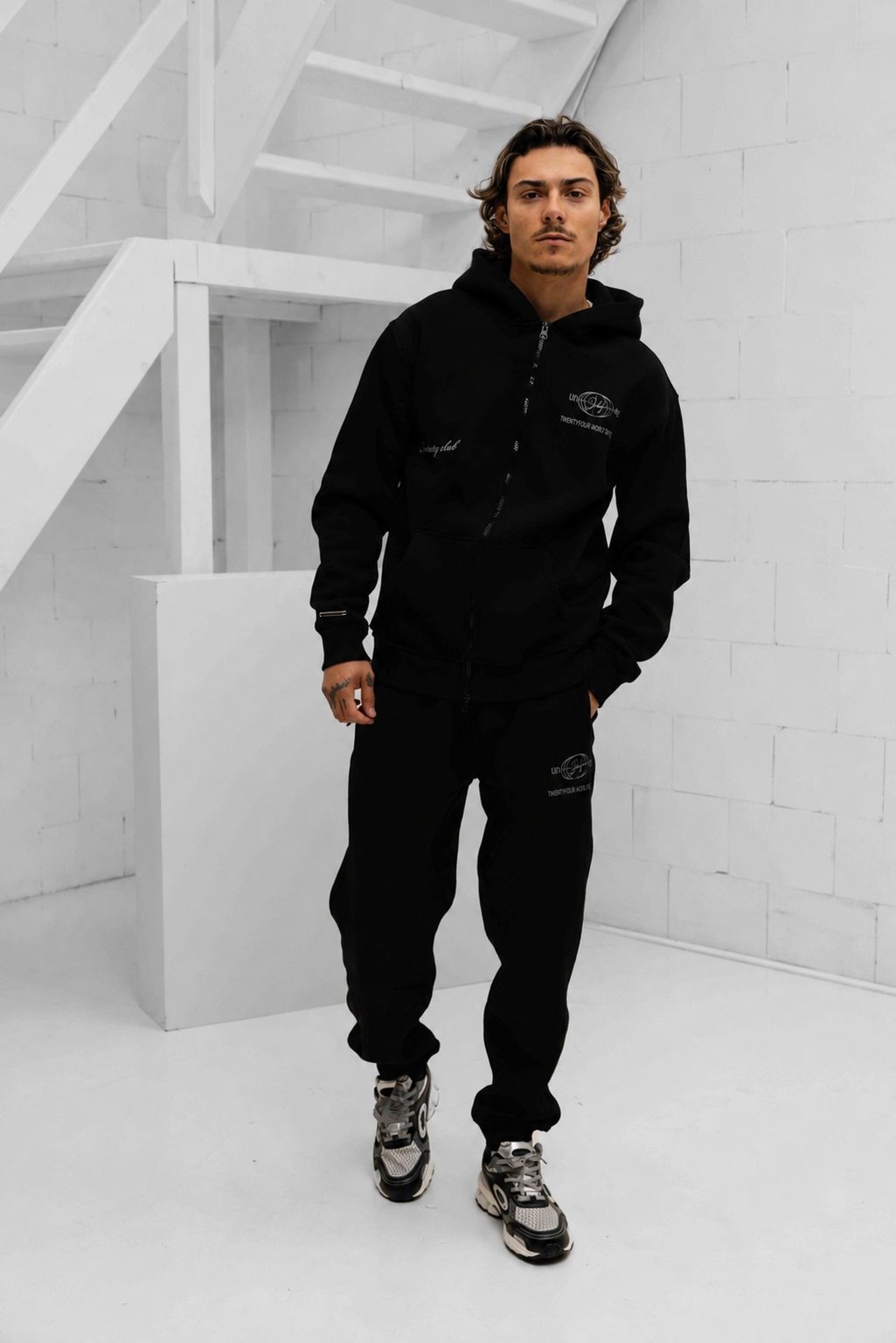 World Zipped Trainingspak Heren Zwart