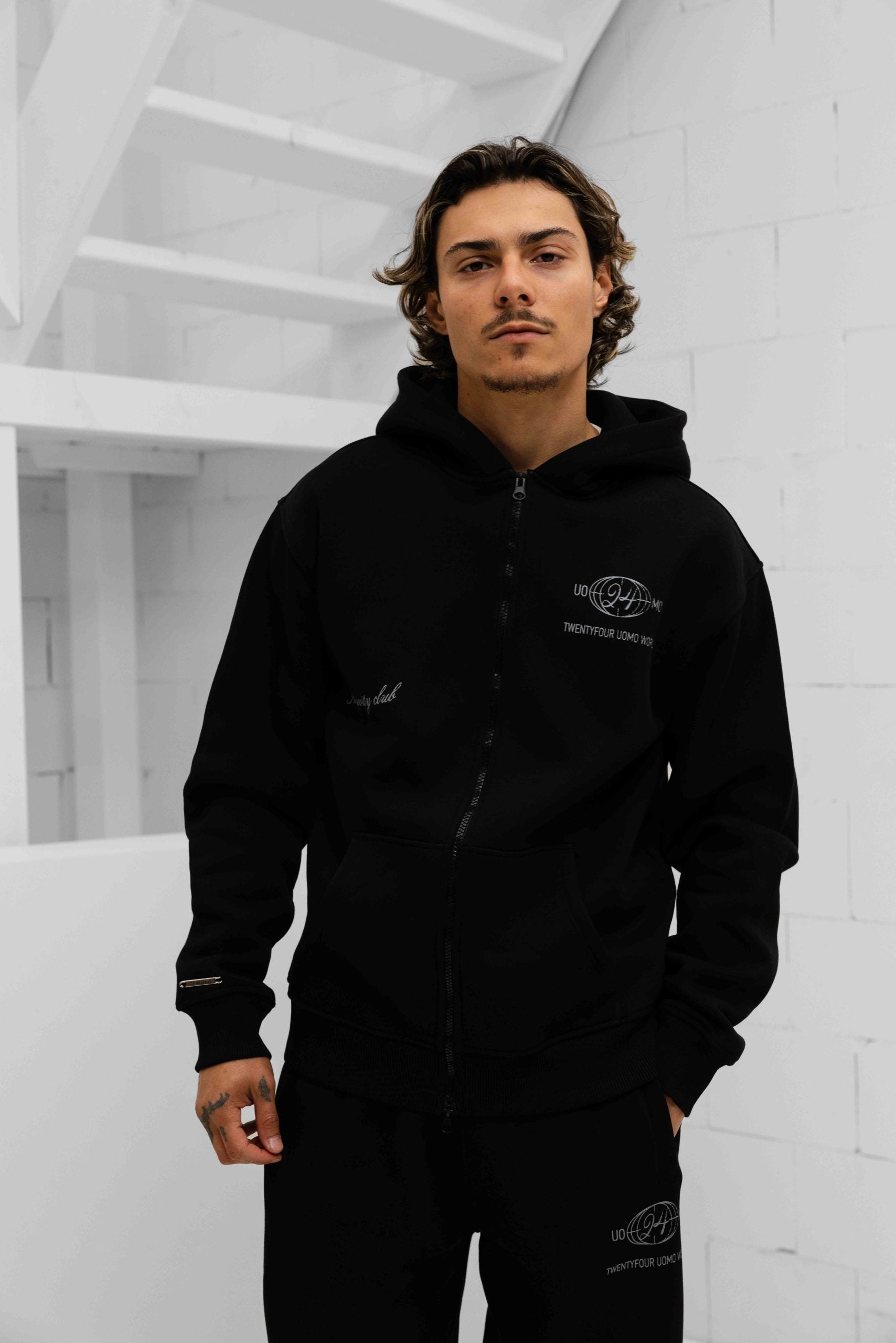 World Zipped Trainingspak Heren Zwart