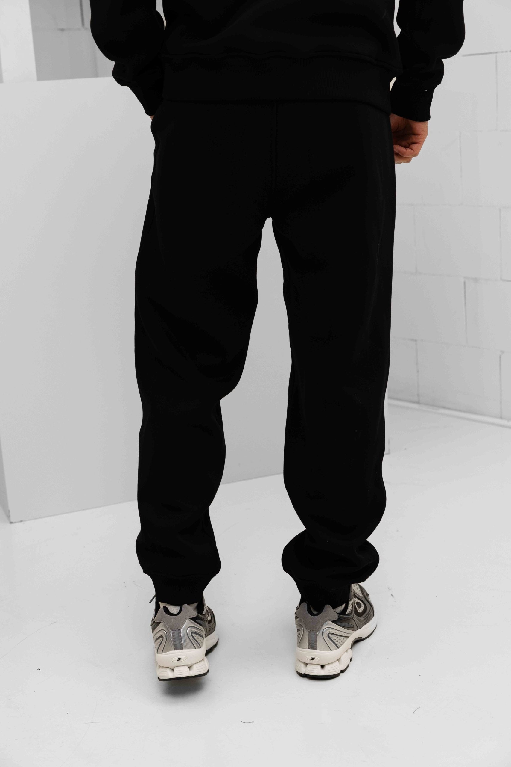 World Zipped Trainingspak Heren Zwart